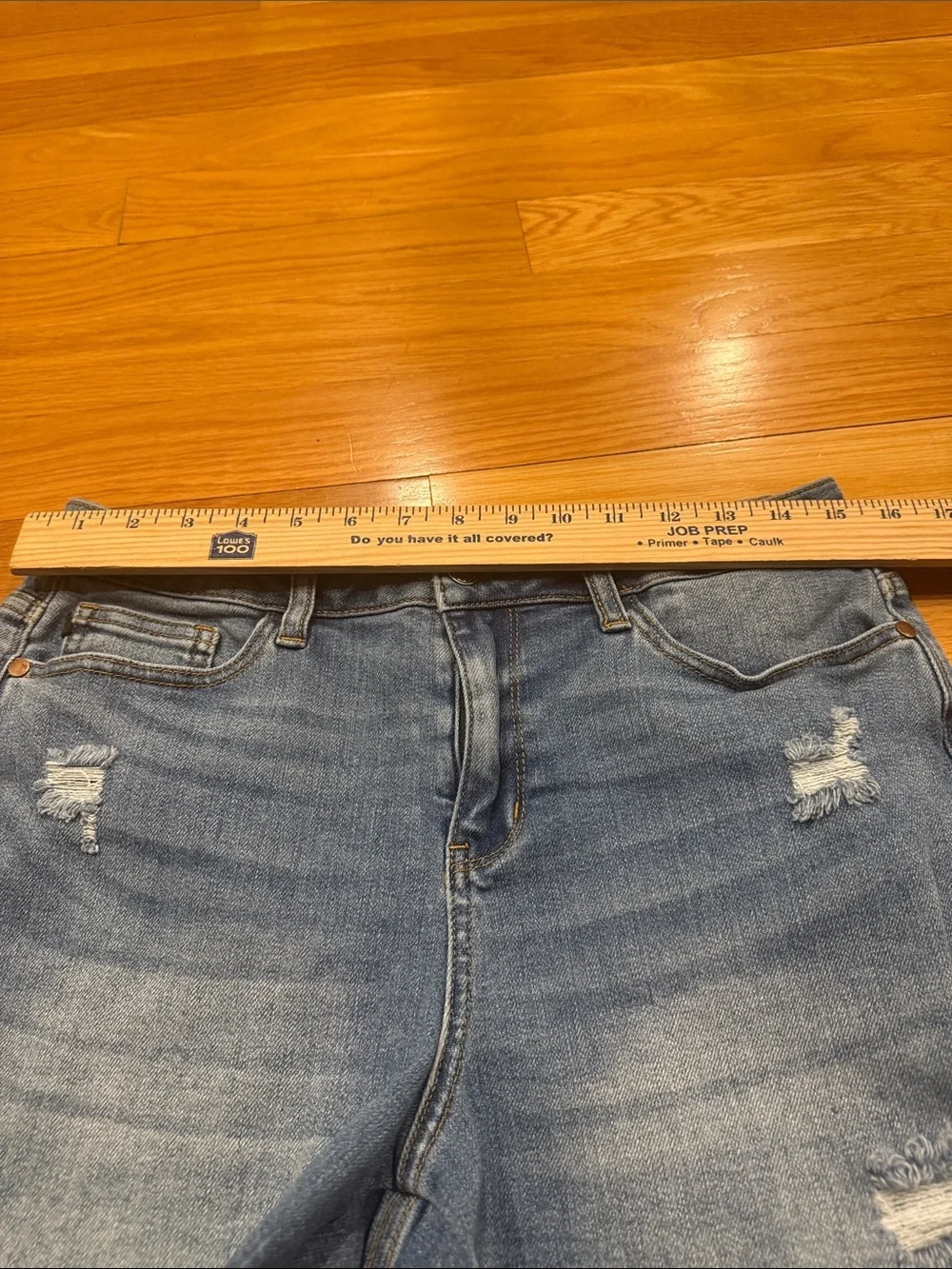 Judy Blue high waisted mild distressed raw hem jeans shorts size large .